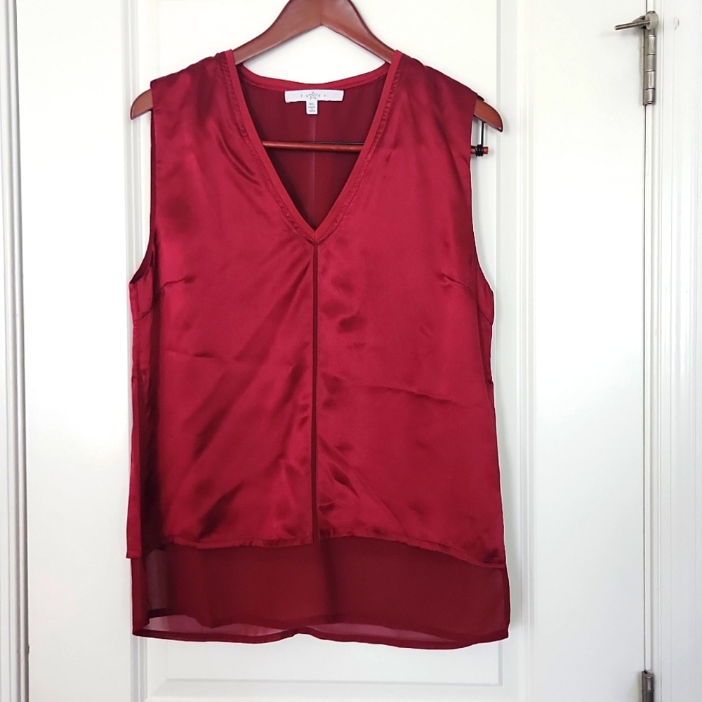 Maroon silk blouse sheer bottom trim.